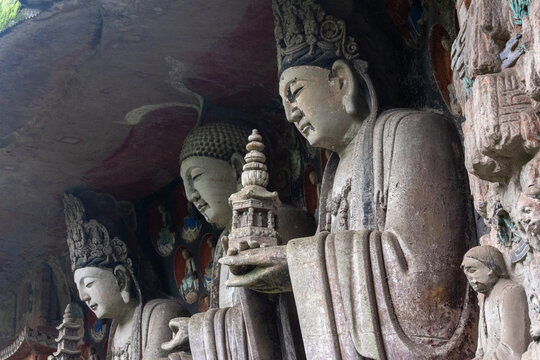 Sculpture of Three Worthies of Huayan located at Dazu Rock Carvings on Mount Baoding, Dazu, China.