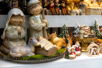 Festive christmas shop window with figurines and holiday decorations