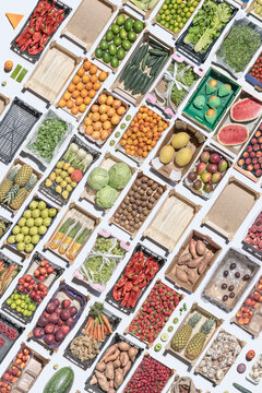 colorful fruity mosaic made of wooden crates with fruit