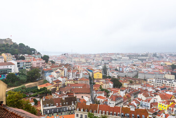 Colorful hillside view over historic Lisbon rooftops