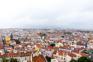 Colorful hillside view over historic Lisbon rooftops