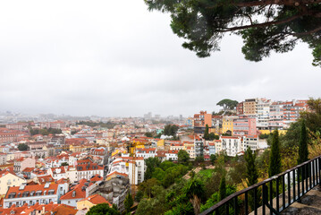 Colorful hillside view over historic Lisbon rooftops