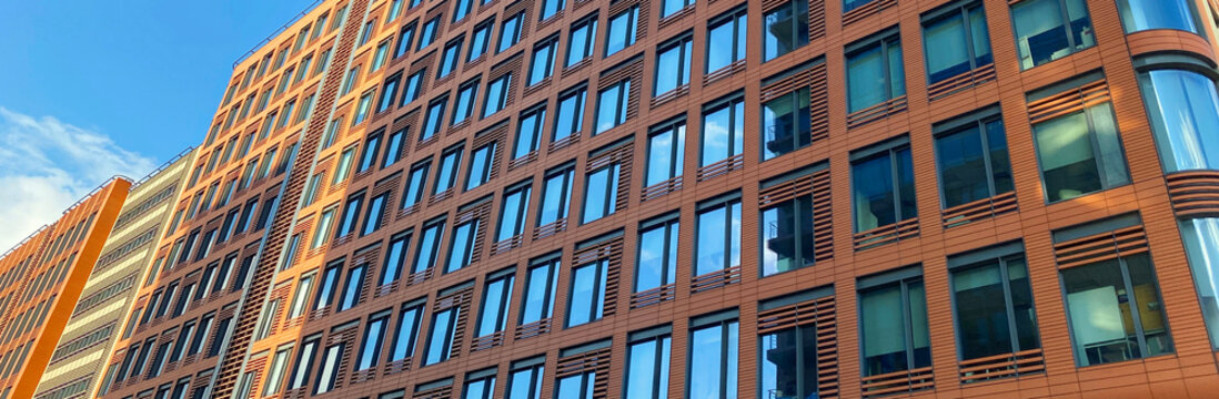 Architecture and real estate, modern residential apartment building with large panoramic windows