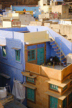 Old apartment building in blue city Jodhpur in India 