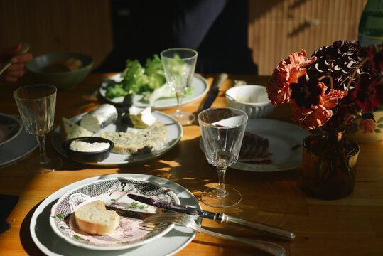 Rustic Table Full of Cheese 
