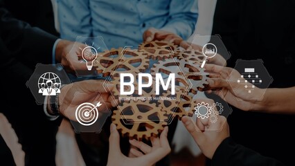 This image showcases a diverse team collaborating on business process management, emphasizing teamwork and the use of technology to enhance efficiency and productivity. Raster