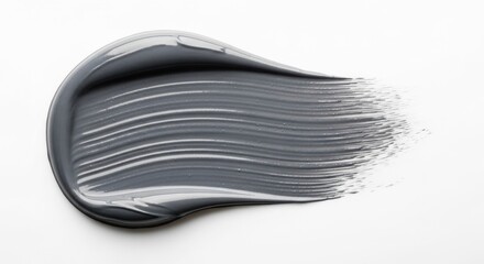 Gray clay smear texture on a white background. Natural cosmetic ingredient sample.