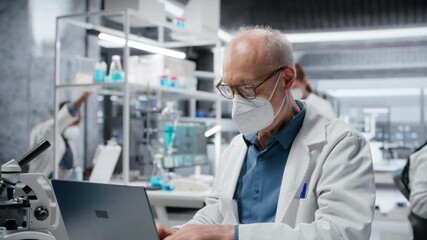 Elderly scientist wearing surgical mask working on laptop in lab, studying genomics. Senior man in laboratory studying DNA strand mapping on notebook, doing scientific innovations, camera B - Powered by Adobe
