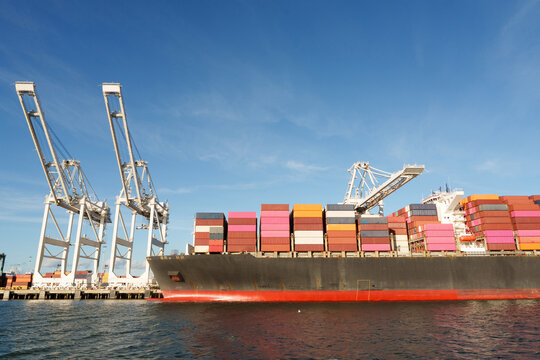 Cargo ship loaded down with cargo boxes