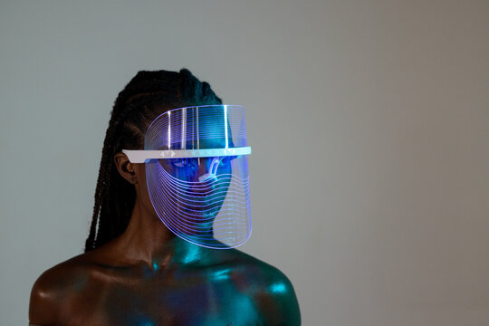 Model Wearing Futuristic Light-Up Visor