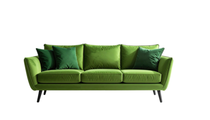 A vibrant, emerald green sofa with matching pillows, isolated against a stark black background