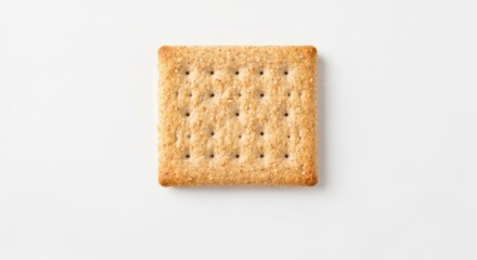 A close-up shot of a single square cracker, lightly salted, isolated on a white background