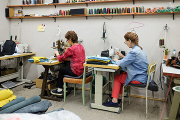 Focused Craftsmanship in a Textile Workshop

