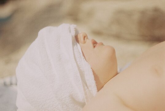 Soft Focus Portrait with White Towel and Natural Light