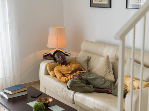 Tired woman taking a day nap 