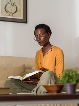 Mindful woman studying at home