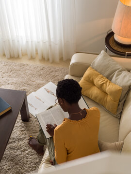 Woman studying at cozy home