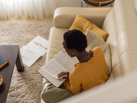 Student reading academic book