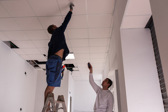 Renovation professionals preparing for works