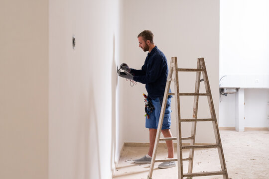 Electrician renovating wiring at home 
