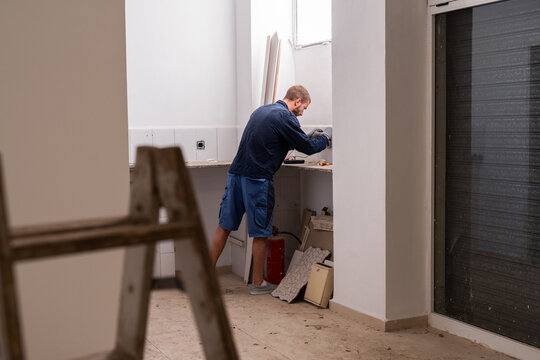Electrician checking switches and sockets 