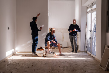 Group of builders at construction site