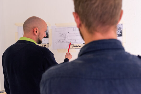 Workers discussing project