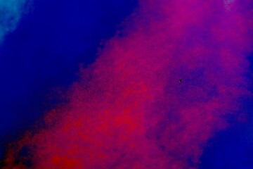 Illustration of a abstract blue background with pink and red clouds.Abstract blue background with water and clouds. Aerial view of a ground in blue. Illustration of a water and a sky.