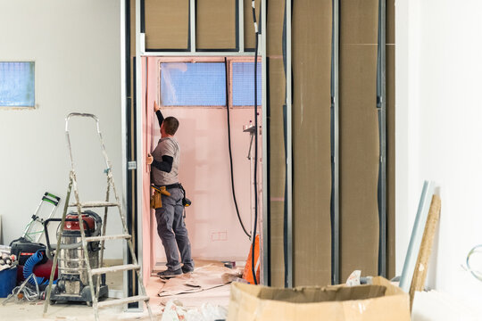 Contractor building a new wall 