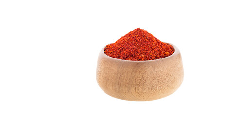 Organic ground or crushed annatto in the bowl - Bixa orellana