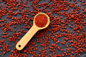 Bixa Orellana - Crushed annatto seeds in the spoon