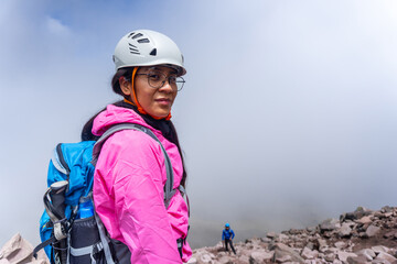 Woman hiker climbing malinche volcano in mexico