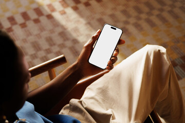 1. Phone Mockup with White Screen in Cozy Warm Setting