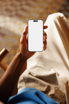 Phone Mockup with White Screen in in Warm Lounge