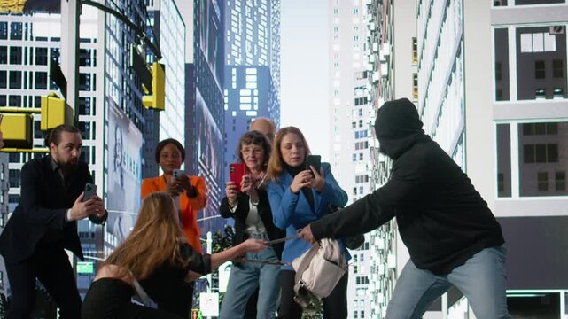 Illegal robbery shows black man stealing handbag on city on street, bystanders ignoring the assault and showing negligence in helping girl victim. Disconnection and phone dependency. Camera A.