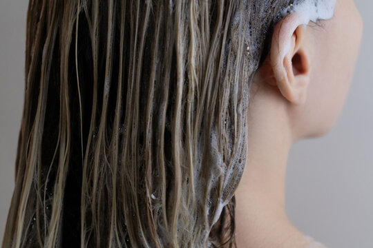 Soaped Wet Hair with Foam on Light Hair