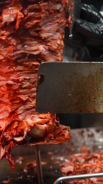  Close-Up of Sizzling Hot Al Pastor Meat on Grill in Street food Outdoor Setting - Taco Stand Series 