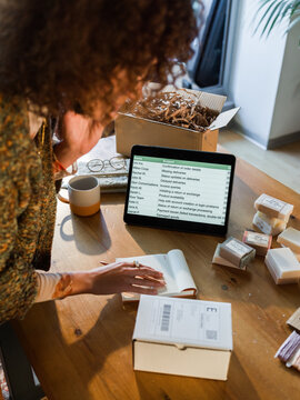 Woman talking to client via phone 