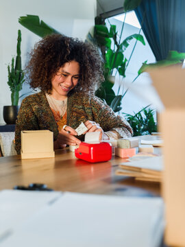 Seller preparing goods for customers 