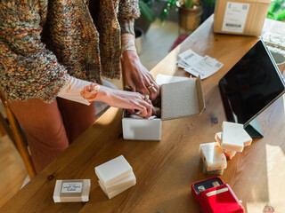 Woman preparing order for shipment