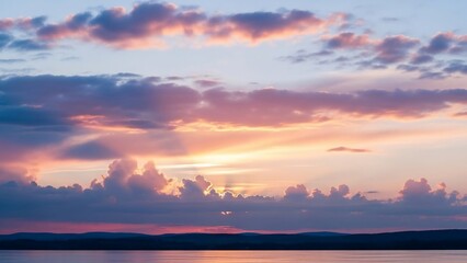 Sunset cloudscape over water © Aby