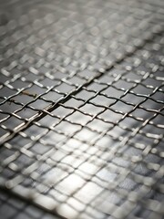 Steel wire netting surface, abstract industrial texture background