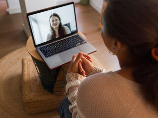Woman consulting online with coach