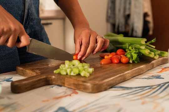 Woman chopping vegetables