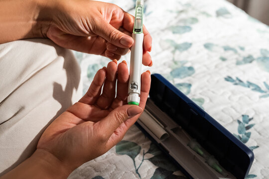 Insulin Pen in Use for Diabetes Management at Home