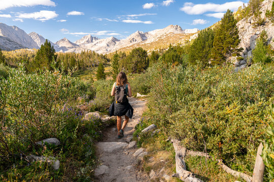 hiker walking in scenic landscape 