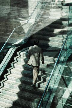 Man ascending the staircase