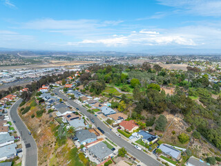 Fototapeta premium Aerial view of middle class houses in the valley of Oceanside town in San Diego, California. USA.