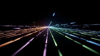 Abstract multicolor light trails moving forward in perspective symbolizing speed, technology, data flow, and future direction