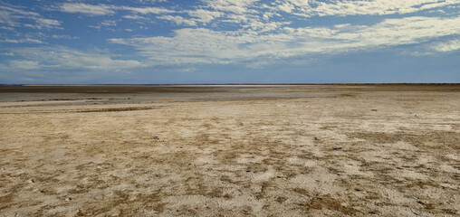 Scenic Desert Landscape with cloudy Blue Sky on the road to Lake Eyre